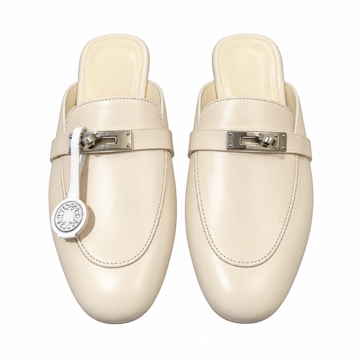 Hermès Ivory Mules with Silver-Tone Hardware